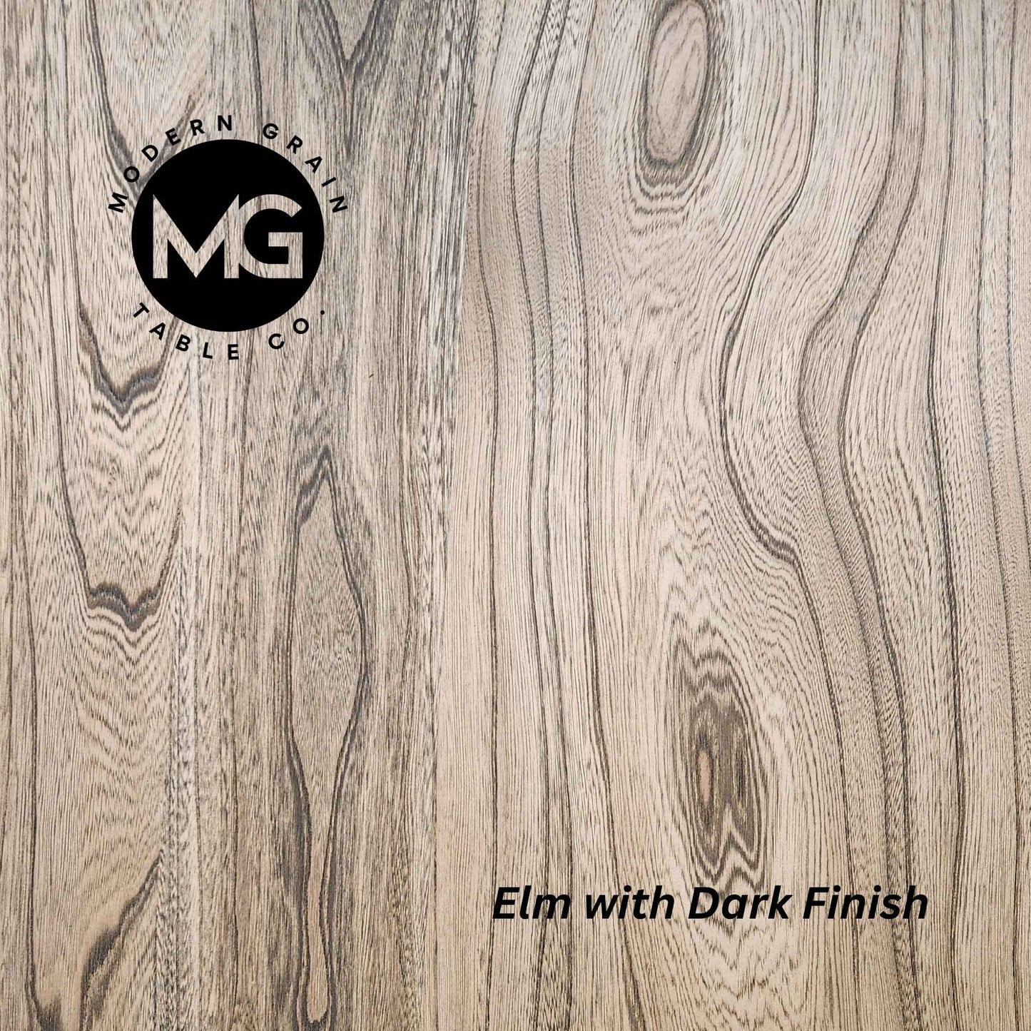 Close-up of Elm hardwood with Dark finish from Modern Grain Table Co., highlighting dramatic grain patterns, rich tone, and natural wood texture.