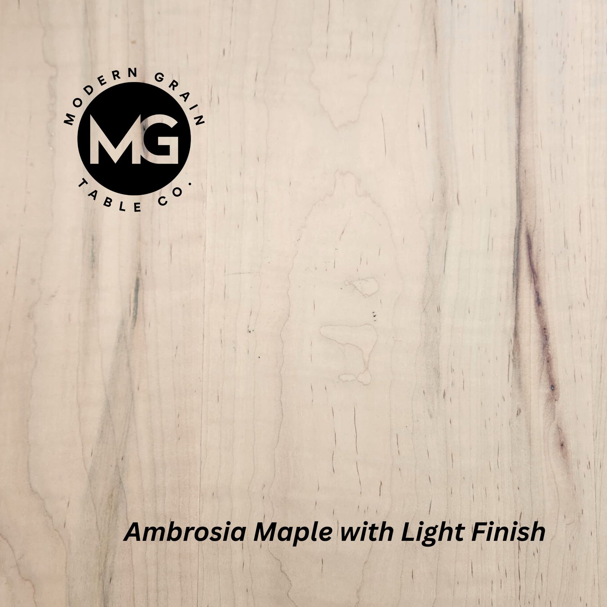 Detailed image of Ambrosia Maple wood showing creamy base tones with unique gray and brown streaks
